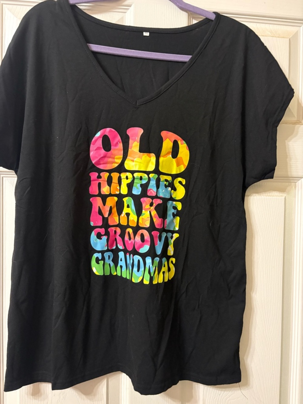 Black Tee with Rainbow Tie-Dye 'Old Hippies Make Groovy Grandmas' Graphic